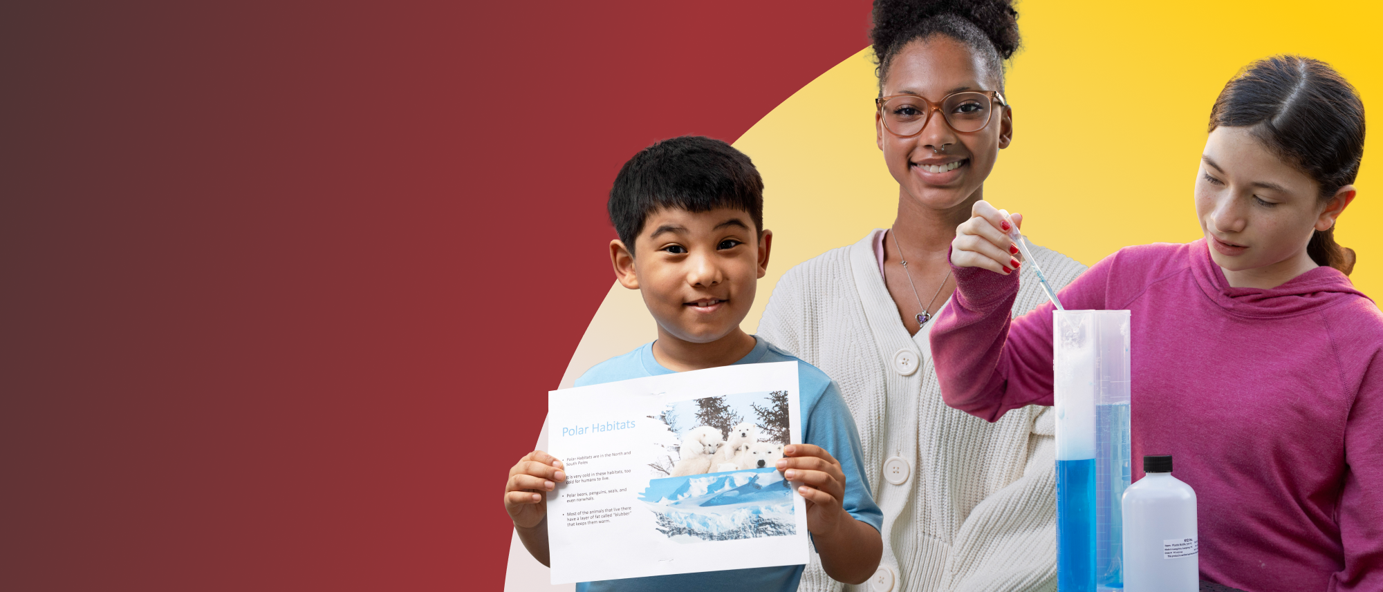 Students smiling, with experiments and paper